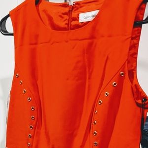 Knee length red sleeveless dress